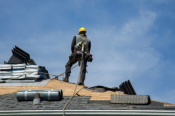 Professional Roofing technician working in Lenox Dale, MA